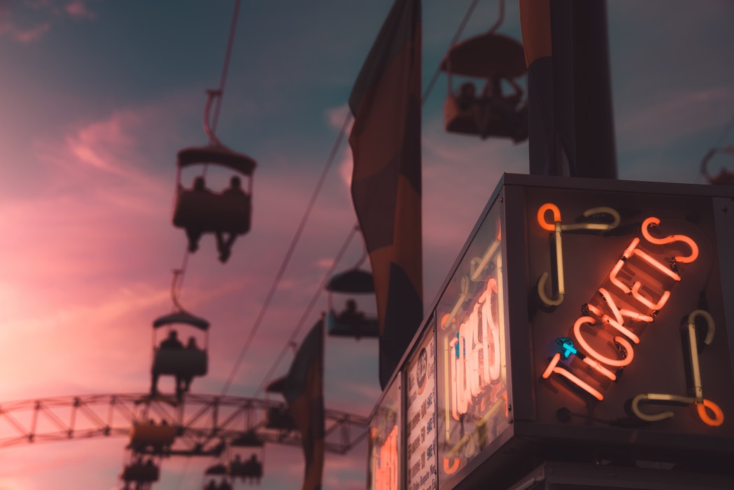 A ticket booth at sunset.